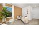 Cozy bonus room with comfortable seating and natural light from a large window at 11209 Cardinal Creek Ave, Charlotte, NC 28215