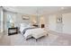 Spacious main bedroom with neutral walls, carpeted floors, and elegant furnishings at 1220 Elrond Nw Dr, Charlotte, NC 28269