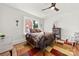 Cozy bedroom features a colorful rug, stylish furniture, and lots of natural light at 124 Marion St, Clover, SC 29710