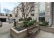 Well-maintained community courtyard with benches and green landscaping at 1315 East Blvd # 203, Charlotte, NC 28203