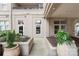 Exterior of building with landscaped entrance and planters at 1315 East Blvd # 203, Charlotte, NC 28203