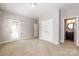 Spacious bedroom featuring a walk-out to a deck, large closet and ensuite bathroom at 14010 Promenade Dr, Huntersville, NC 28078