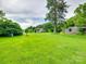 View of grassy yard with a couple sheds at 1406 Old Puckett Pl # 14, York, SC 29745
