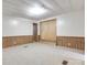 Bedroom featuring paneled walls and sliding door closet space at 1406 Old Puckett Pl # 14, York, SC 29745