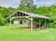 Open-sided car port-style structure in backyard at 1406 Old Puckett Pl # 14, York, SC 29745