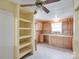 Traditional kitchen featuring light wood cabinets, open shelving, and a ceiling fan at 1406 Old Puckett Pl # 14, York, SC 29745