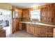 Traditional kitchen featuring light wood cabinets and dual basin sink at 1406 Old Puckett Pl # 14, York, SC 29745