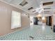 Expansive living room with patterned flooring, neutral walls, bright lighting, and open doorway to kitchen at 1406 Old Puckett Pl # 14, York, SC 29745