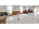 Spacious living room features wood paneling, laminate floors, and sliding glass doors for natural light at 1406 Old Puckett Pl # 14, York, SC 29745