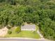 Aerial view of a charming home, surrounded by lush greenery, showcasing its serene location at 159 Blackmon Pond Rd, Lancaster, SC 29720