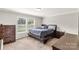 Comfortable bedroom with natural light, carpet flooring and a full bed set at 159 Blackmon Pond Rd, Lancaster, SC 29720