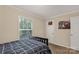 Cozy bedroom featuring a window with natural light, complemented by simple decor at 159 Blackmon Pond Rd, Lancaster, SC 29720