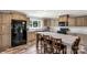 Updated kitchen featuring a large center island with bar seating, stainless steel appliances and ample storage at 159 Blackmon Pond Rd, Lancaster, SC 29720