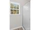 Bright bathroom featuring a walk-in shower with textured glass and a window with natural light at 159 Forest Abbey Ln, China Grove, NC 28023