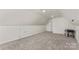 Spacious bonus room features carpet, a desk, a chair, and dormer access at 159 Forest Abbey Ln, China Grove, NC 28023