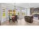 Bright kitchen featuring an island and eat in breakfast area filled with natural light at 159 Forest Abbey Ln, China Grove, NC 28023