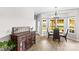 Kitchen with wood floors, eat in table and chairs, and view to large backyard at 159 Forest Abbey Ln, China Grove, NC 28023