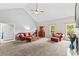 Inviting living room featuring vaulted ceiling, plush carpet, and cozy seating arrangement at 159 Forest Abbey Ln, China Grove, NC 28023
