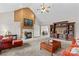 Spacious living room with vaulted ceiling, fireplace, and built-in shelving, perfect for entertaining at 159 Forest Abbey Ln, China Grove, NC 28023