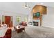 Inviting living room featuring fireplace, and ample natural light at 159 Forest Abbey Ln, China Grove, NC 28023