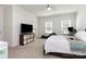 Bright bedroom features carpeted floors, natural light, and ample space at 1593 Bloomfield Rd, Rock Hill, SC 29732