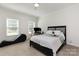 Bedroom featuring large windows providing natural light and neutral carpeting at 1593 Bloomfield Rd, Rock Hill, SC 29732