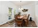 Cozy dining room featuring hardwood flooring and plenty of natural light from the exterior doors at 1593 Bloomfield Rd, Rock Hill, SC 29732