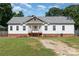 Charming single-story home featuring a welcoming front porch and well-maintained lawn at 1593 Bloomfield Rd, Rock Hill, SC 29732