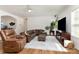 Open living space with modern furnishings, hardwood floors, and plenty of natural light at 1593 Bloomfield Rd, Rock Hill, SC 29732