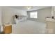 Spacious bedroom with neutral walls, carpet, natural light, and a whimsical loft bed at 169 Halifax Dr, Fort Mill, SC 29707