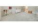 Bright bedroom with light-colored carpet, white trim, and a neutral color palette at 169 Halifax Dr, Fort Mill, SC 29707