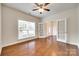 Empty bedroom with hardwood floors, ceiling fan, and French doors at 169 Halifax Dr, Fort Mill, SC 29707
