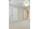 Light-filled room with neutral carpet and paint, plus doors to the hall and ensuite at 169 Halifax Dr, Fort Mill, SC 29707