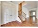 Spacious foyer with hardwood floors, staircase, and arched doorway at 169 Halifax Dr, Fort Mill, SC 29707