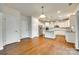 Bright, open kitchen features stainless appliances, granite counters, and hardwood floors at 169 Halifax Dr, Fort Mill, SC 29707