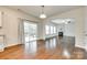 Open living area with hardwood floors, fireplace, and sliding glass doors to the deck at 169 Halifax Dr, Fort Mill, SC 29707