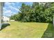 Expansive backyard with lush green grass, ideal for outdoor activities and relaxation at 1691 Ashley Lynn Ct, Stanfield, NC 28163