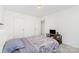 Comfortable bedroom with carpet and door to hallway at 1691 Ashley Lynn Ct, Stanfield, NC 28163