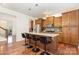 Modern kitchen island featuring granite countertops, stainless steel appliances, and ample counter space at 1691 Ashley Lynn Ct, Stanfield, NC 28163