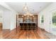 Stylish kitchen island with granite countertops, pendant lighting, and bar stool seating at 1691 Ashley Lynn Ct, Stanfield, NC 28163
