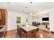 Spacious kitchen island offers seating, storage, and a seamless flow to the living area at 1691 Ashley Lynn Ct, Stanfield, NC 28163