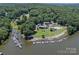 Aerial of a pool, marina, and community clubhouse at 179 Delwood Ct, Mount Gilead, NC 27371