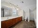 Large bathroom offering double sinks, vanity, and separate toilet area at 179 Delwood Ct, Mount Gilead, NC 27371