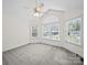 Open and bright empty bedroom with large windows letting in natural light at 179 Delwood Ct, Mount Gilead, NC 27371
