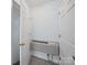 Hallway with access to AC unit, carpeted steps, and a closet at 179 Delwood Ct, Mount Gilead, NC 27371