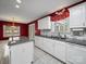 Charming kitchen with granite counters, tile backsplash, and stainless steel appliances at 179 Delwood Ct, Mount Gilead, NC 27371