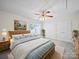 Comfortable main bedroom featuring a ceiling fan, neutral tones, and a cozy bed at 179 Delwood Ct, Mount Gilead, NC 27371