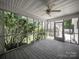 Spacious screened porch with ample natural light and outdoor views, offering a serene retreat at 179 Delwood Ct, Mount Gilead, NC 27371