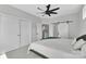 Bedroom featuring a ceiling fan, closet with sliding doors, and neutral walls at 1933 W Trade St, Charlotte, NC 28216