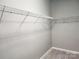 Walk-in closet with wire shelving and gray walls and carpet at 195 Willow Valley Dr, Mooresville, NC 28115